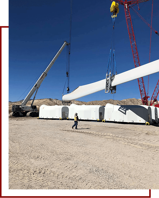 A man standing in front of a crane.